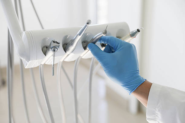 Professional Tooth Extraction technician working in Denton, TX